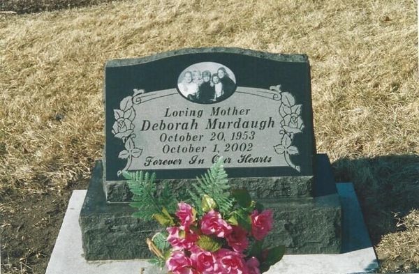 Headstone for Deborah Murdaugh, with a photo and inscription; dates are 1953-2002.