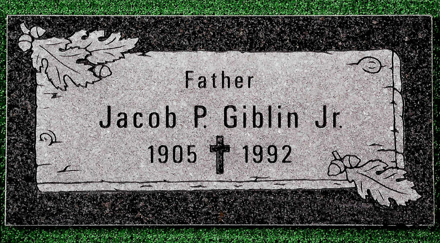A rectangular grave marker with