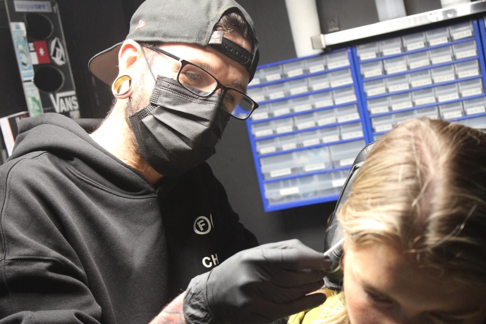 Dublins most experienced Piercer doing a piercing. His name is Sean Dubss