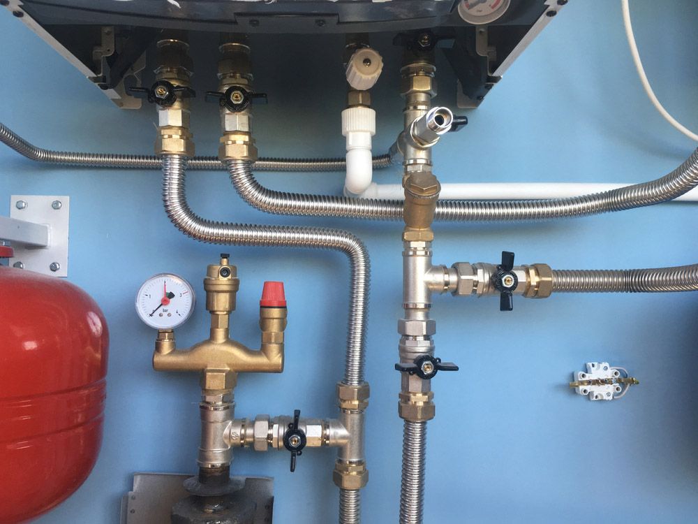 A Close Up of a Boiler With a Clock on It — Brite-Lec Pty Ltd in Currajong, QLD