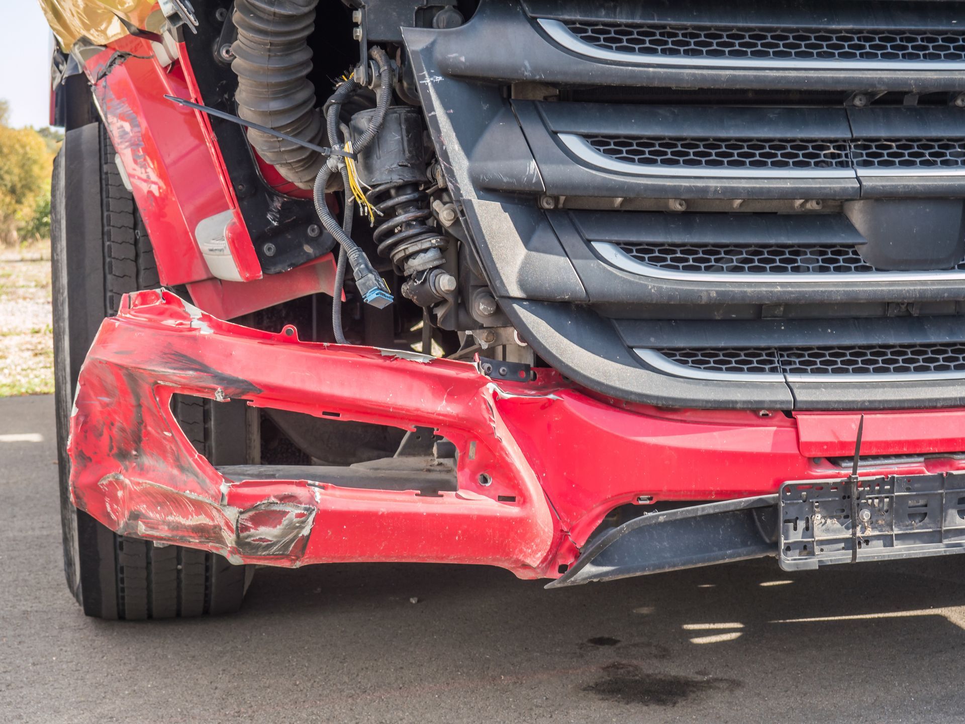 Truck with collision damage, ready for expert repairs at Brisbane Collision Centre in Rocklea.