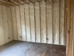 A room with a lot of insulation on the walls and floor.