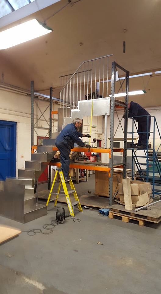 Man on ladders