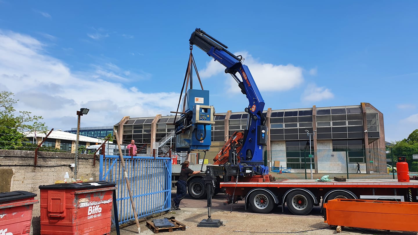 Old laser cutting machine on crane