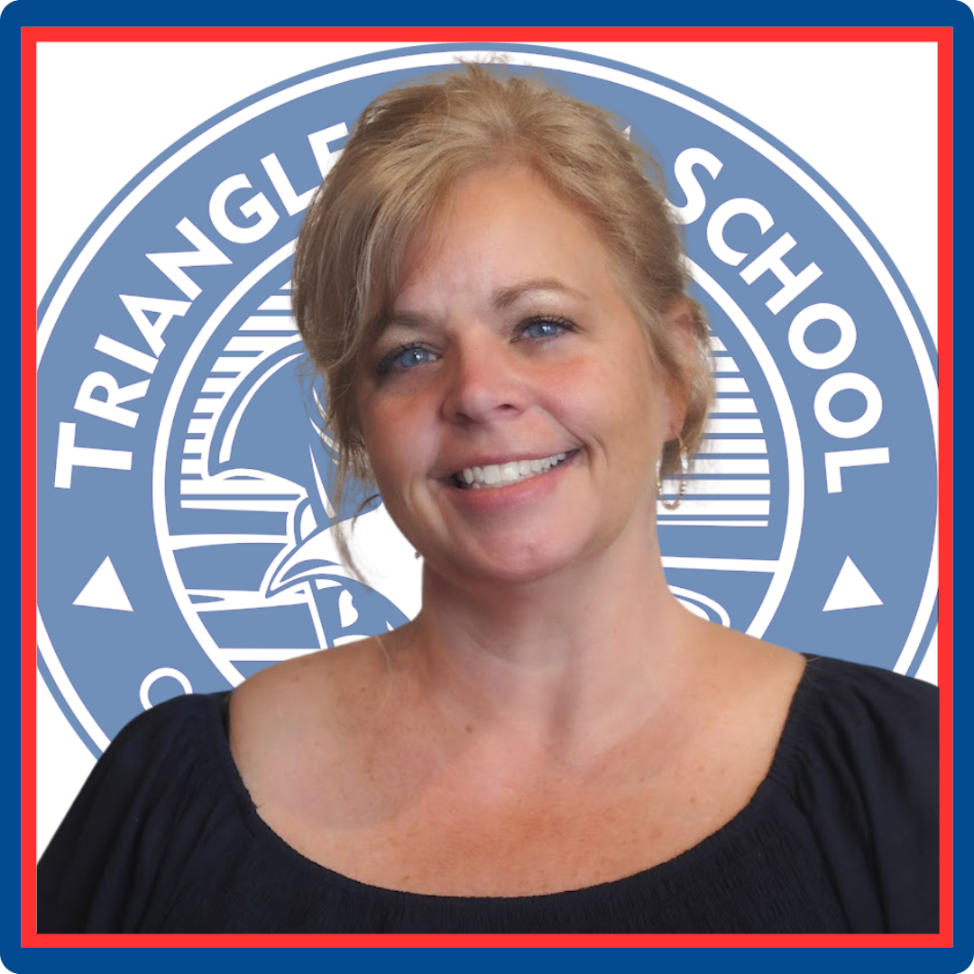 A woman is smiling in front of a triangle school logo