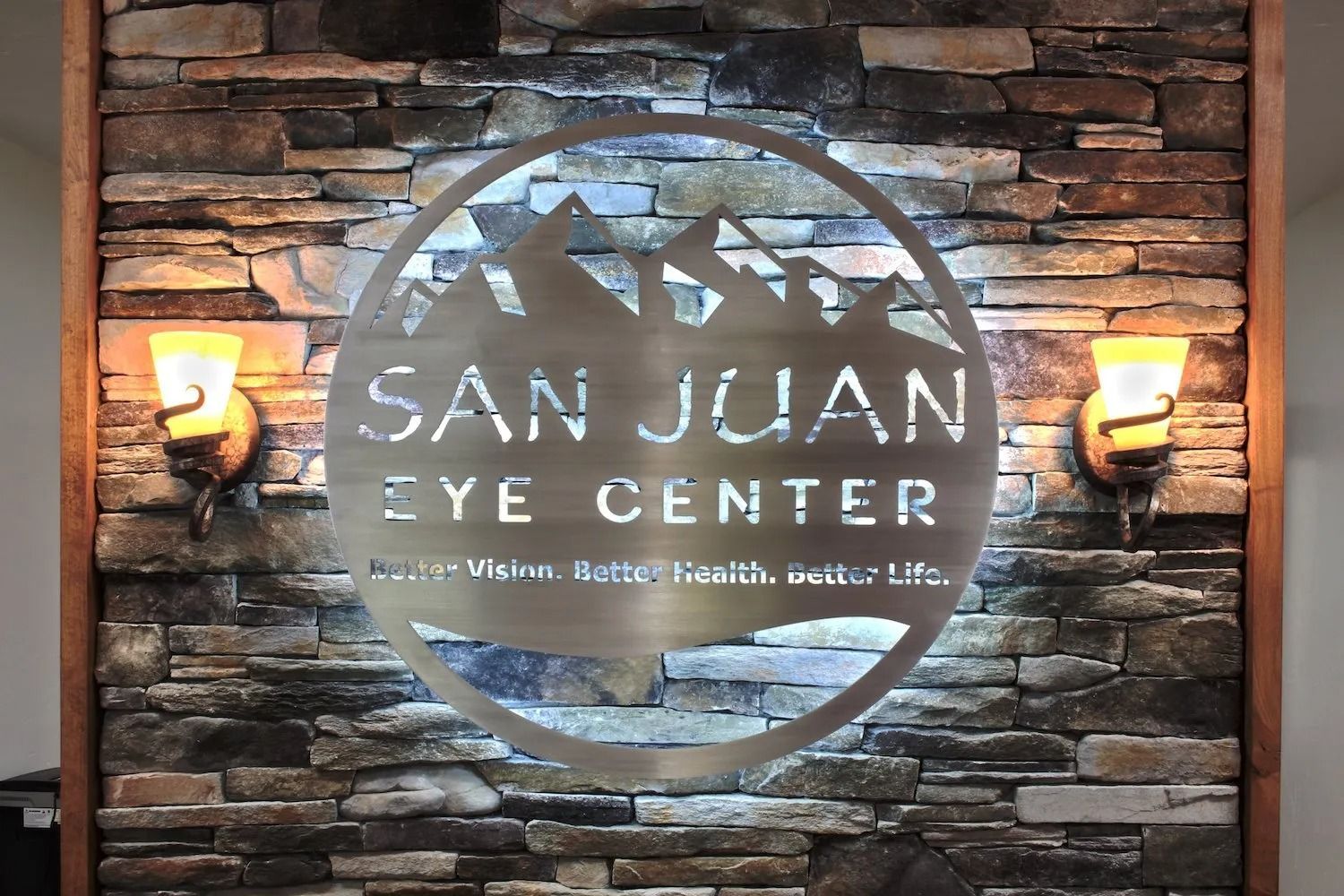 A metallic circular sign for 