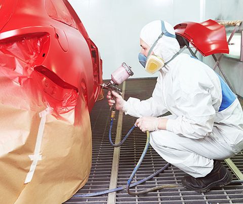 A person working auto body painting — Moravia, NY — Auto Body Repair A person working auto body painting — Moravia, NY — Auto Body Repair
