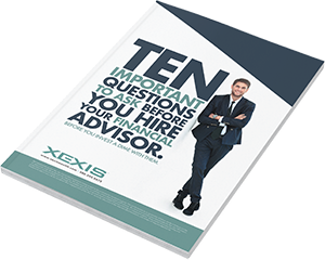 Magazine cover titled “TEN” with a suited man standing beside bold text, white and teal design
