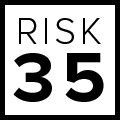 Black-and-white tile with the text “RISK 35” in bold black letters and numbers