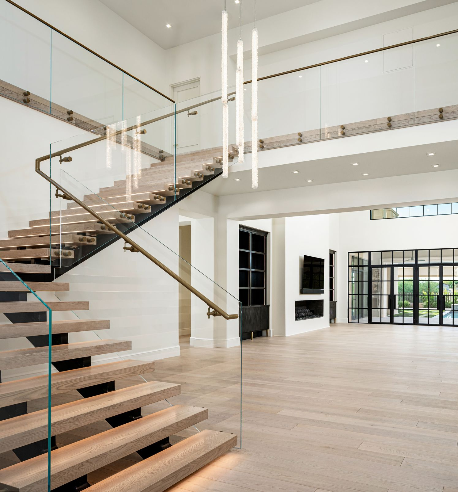 Luxury modern living room with floating staircase architecture