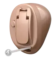 Beige hearing aid with earmold and small clear control lever