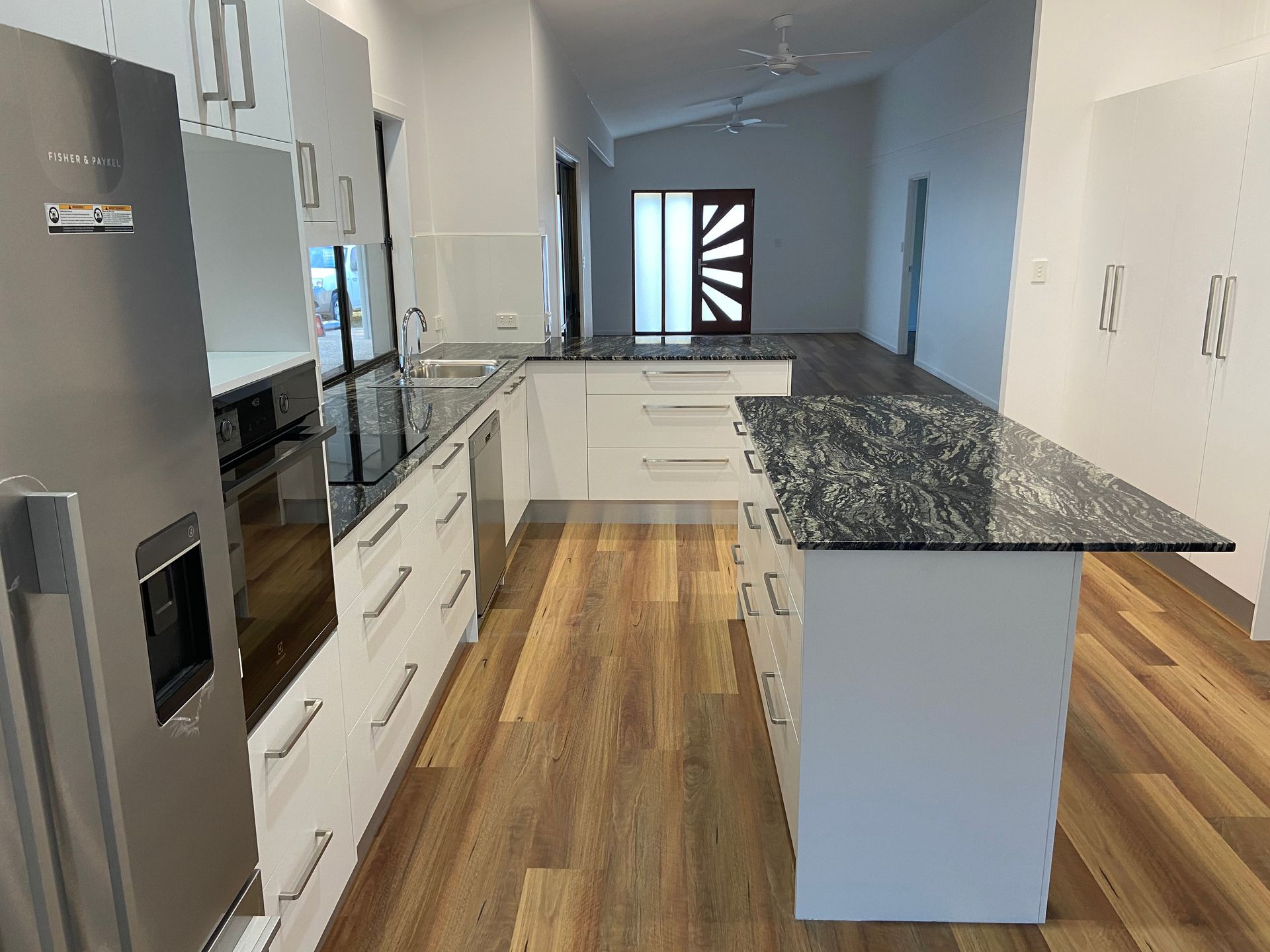Side View of Kitchen Cabinetry Showcasing Craftsmanship and Design — Against the Grain Cabinetry in Rosemount, QLD