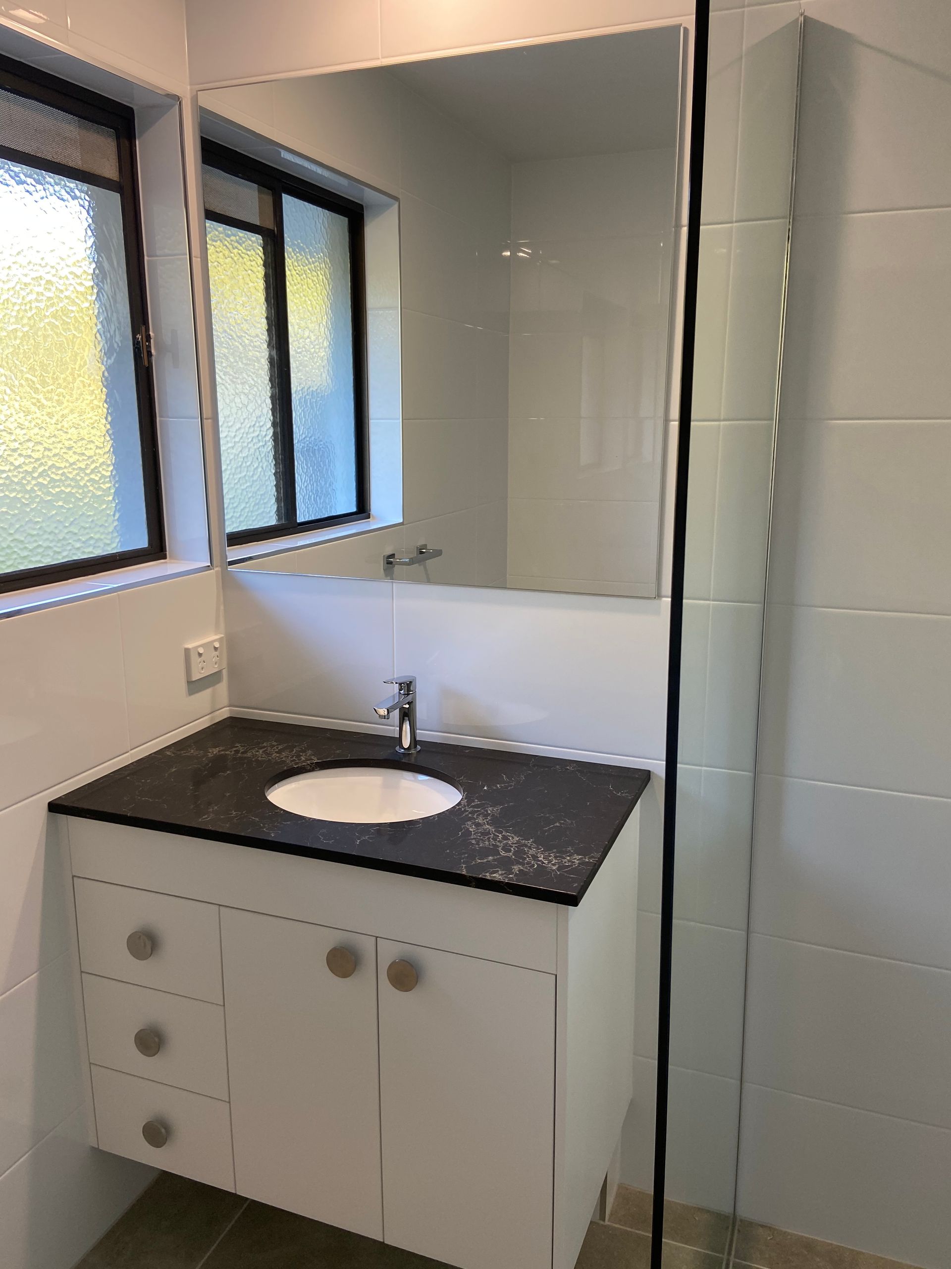 Bathroom Featuring Timber Cabinetry — Against the Grain Cabinetry in Rosemount, QLD
