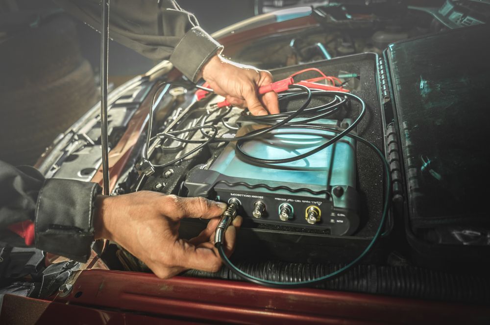 A Person is Working on a Car With a Toolbox — Dynamic Performance Systems in Kingaroy, QLD