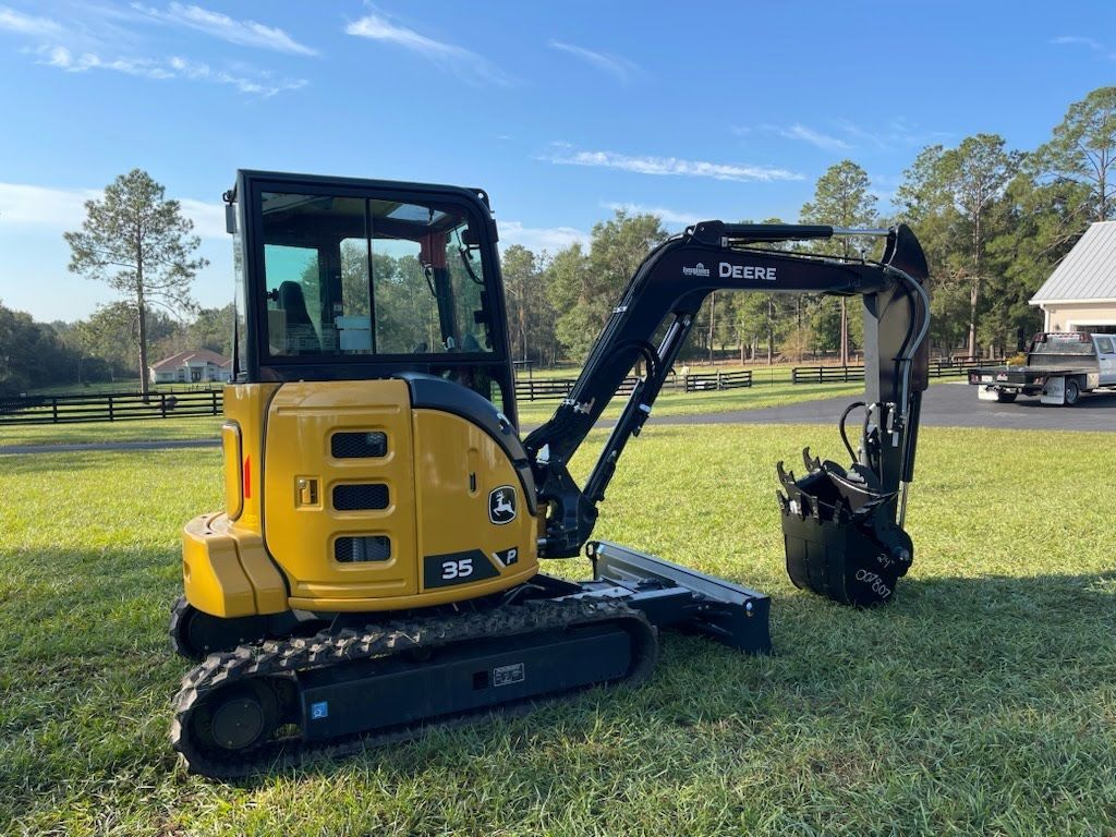 Hydraulic crusher excavator backoe machinery working on site