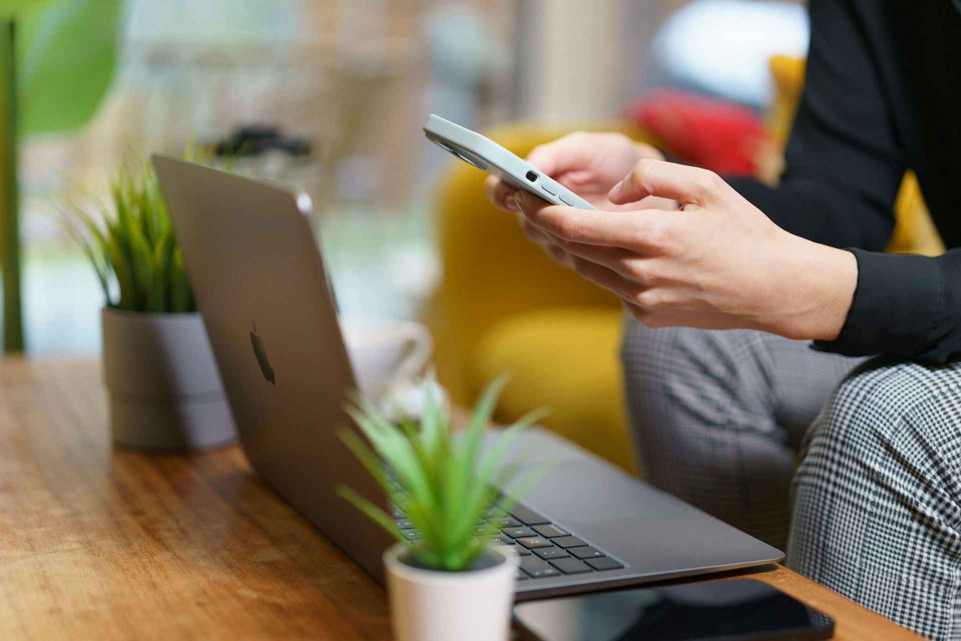 Woman submitting QuickBooks Class review on cell phone