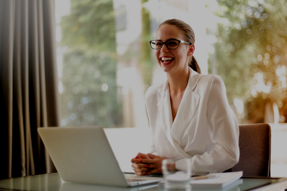 Excited woman learning Advanced Quickbooks