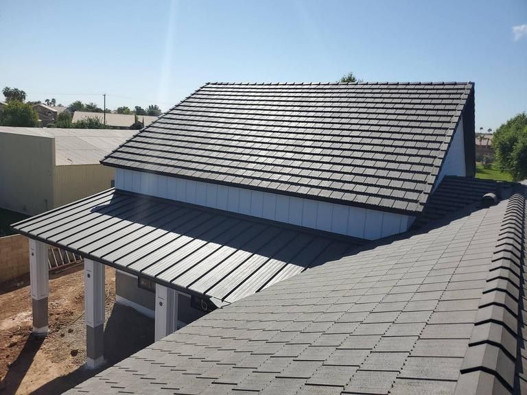 edge roof shingles on top house