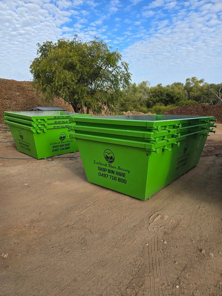 Row of Green Bins — Leichhardt River Nursery & Skip Bin Hire In Kalkadoon, QLD
