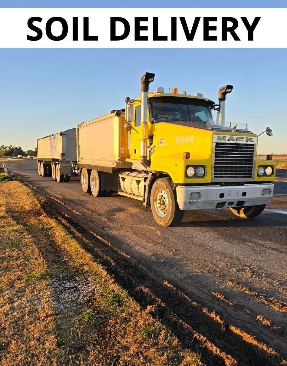 Yellow semi-truck with two trailers, on a road, for soil delivery — Leichhardt River Nursery & Skip Bin Hire In Kalkadoon, QLD