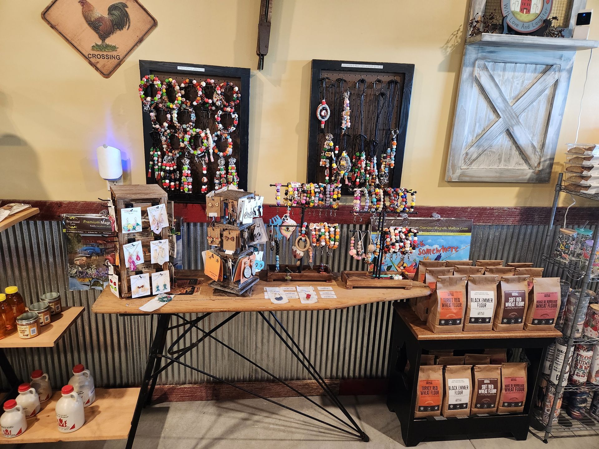A table with a lot of items on it in a room.