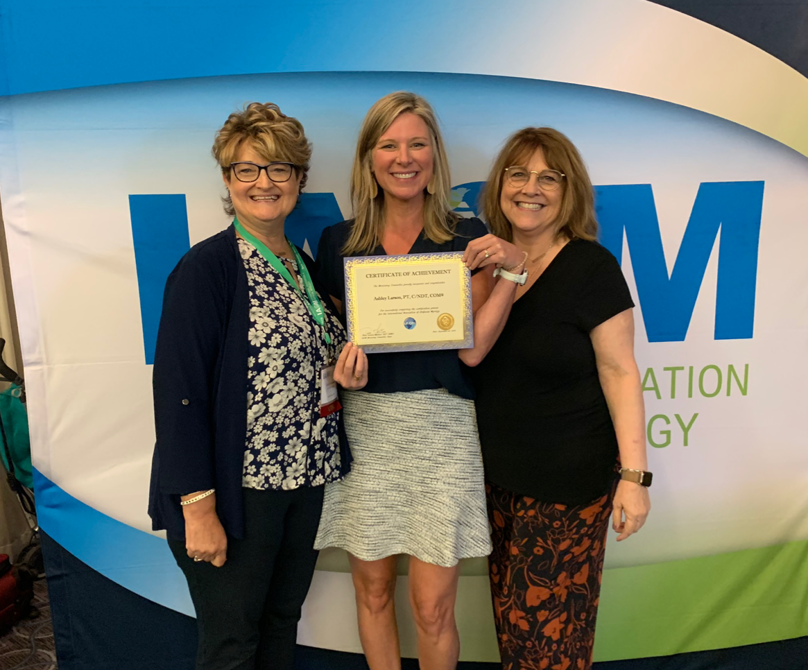 Dianah Davidson, student with certificate of completion, and Mary Billings smiling