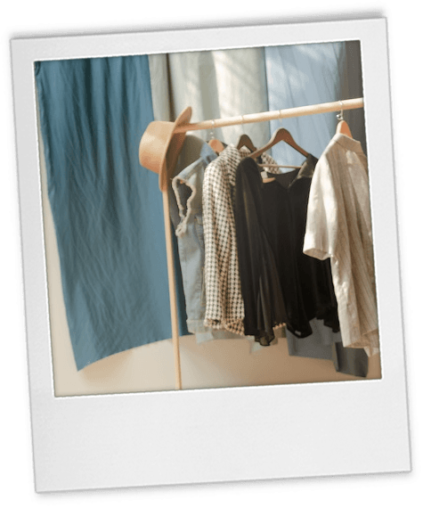 Headshot tip 3 polaroid of a rack with clothes and a hat