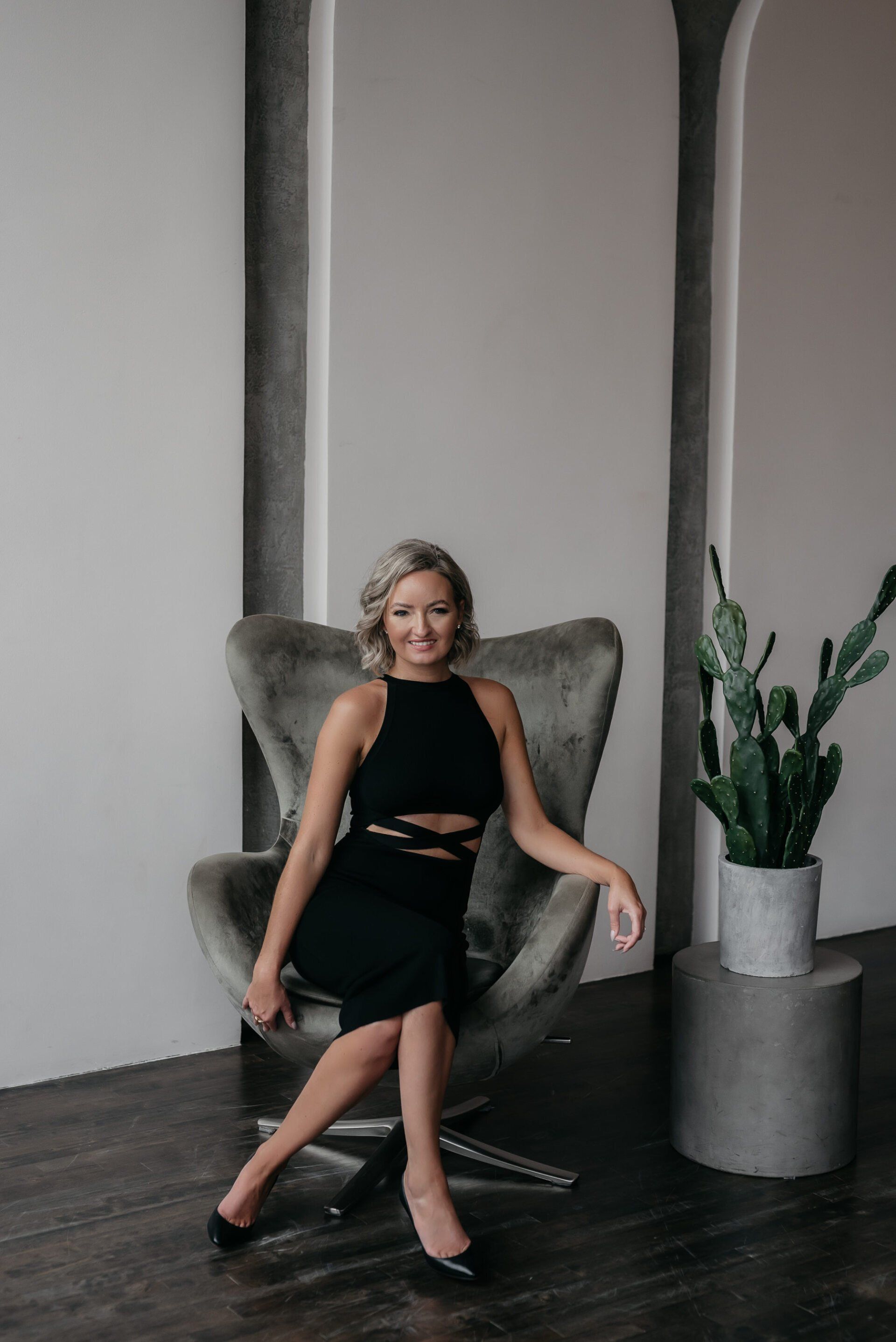 Portrait of a realtor sitting on a chair 3