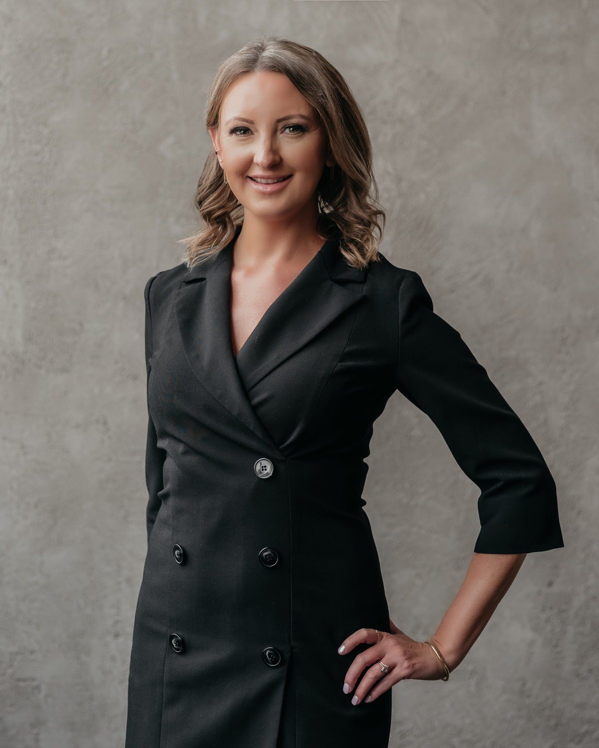 Portrait of a realtor wearing a black dress 1
