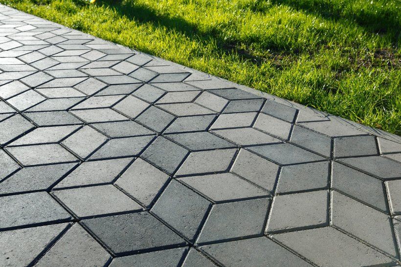 A pathway in a house made with stamped concrete material in Wanneroo WA.