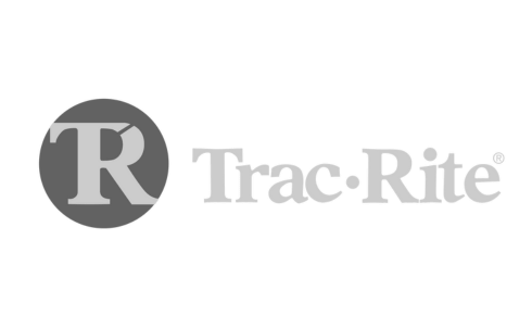 Trac-Rite logo with a gray circle and stylized “R” beside the company name.