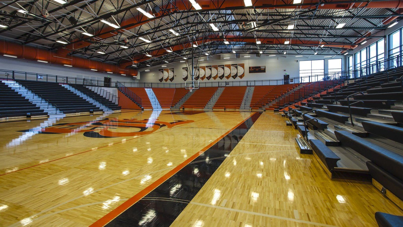 Belding High School features plenty of Interkal EXCEL Seat Modules on telescopic bleachers in stadium configuration.