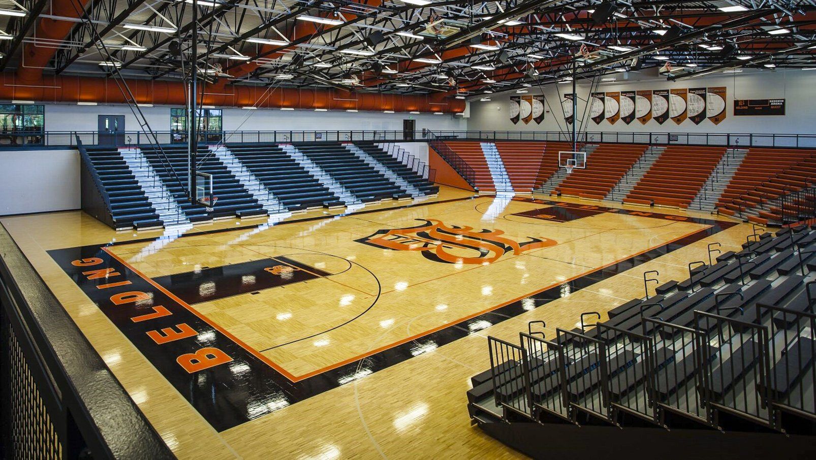 Belding High School features plenty of Interkal EXCEL Seat Modules on telescopic bleachers in stadium configuration.