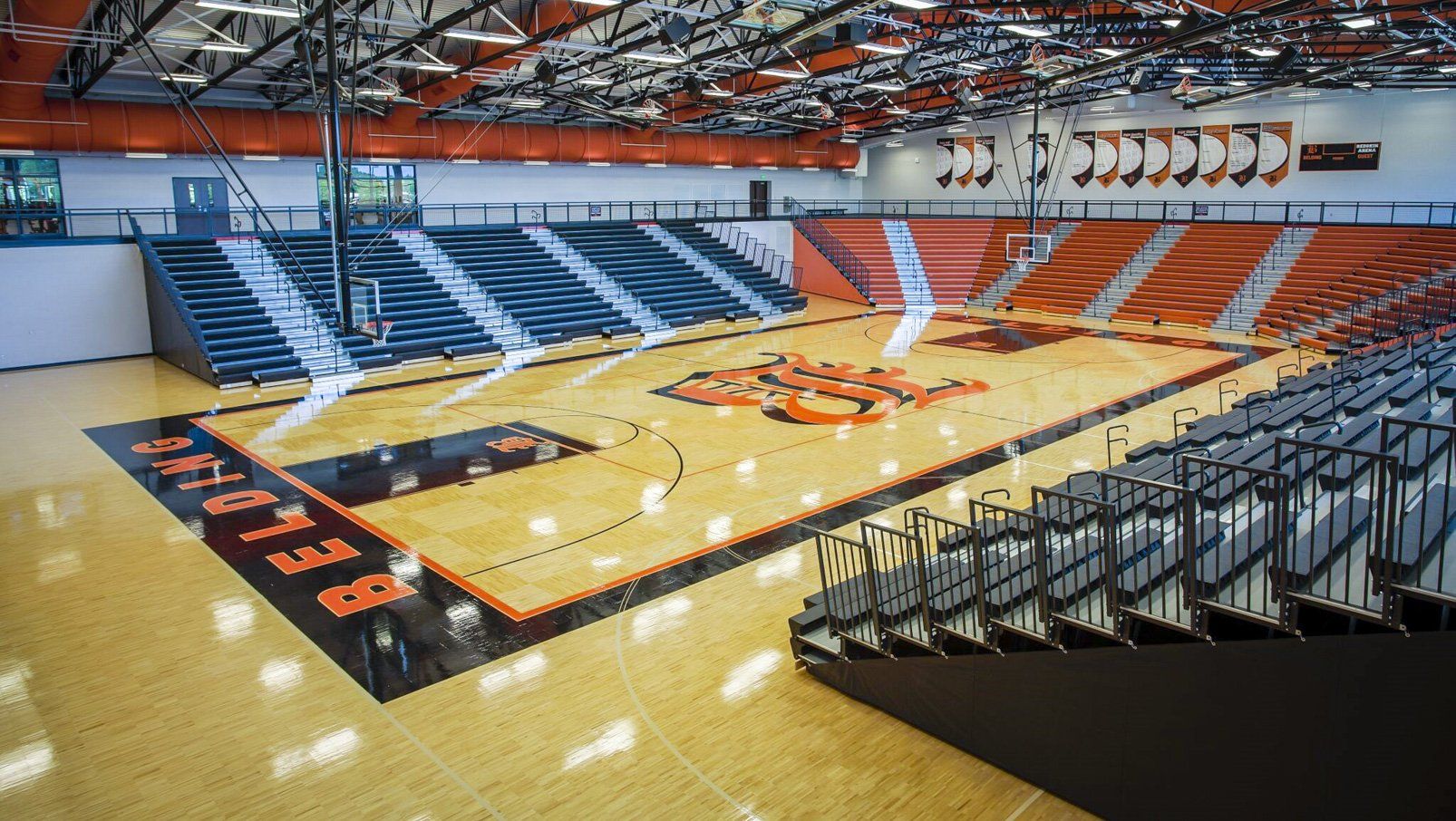 Belding High School features plenty of Interkal EXCEL Seat Modules on telescopic bleachers in stadium configuration.