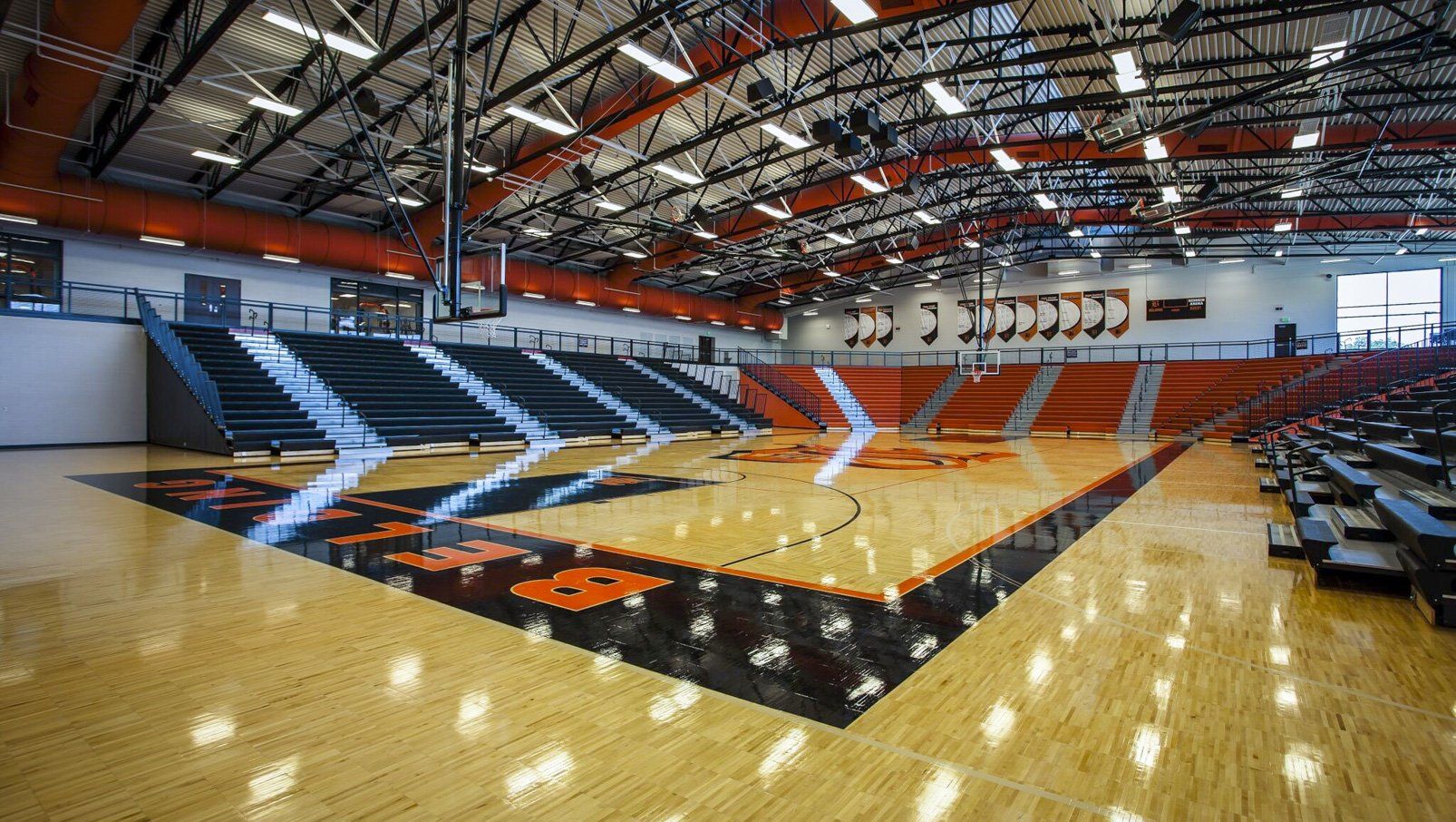 Belding High School features plenty of Interkal EXCEL Seat Modules on telescopic bleachers in stadium configuration.