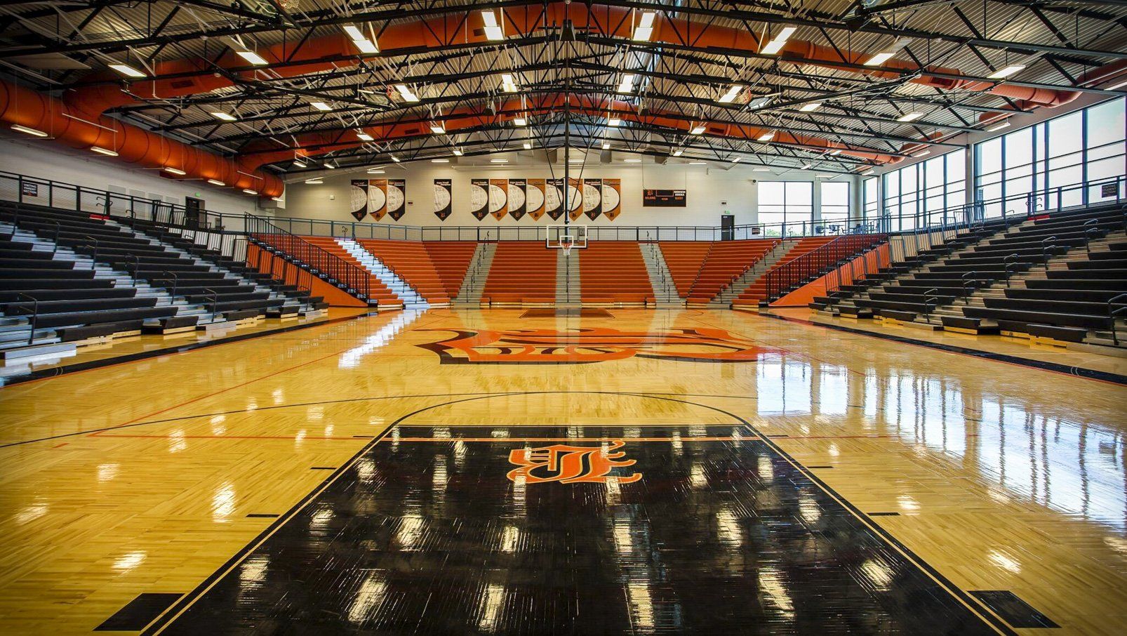 Belding High School features plenty of Interkal EXCEL Seat Modules on telescopic bleachers in stadium configuration.