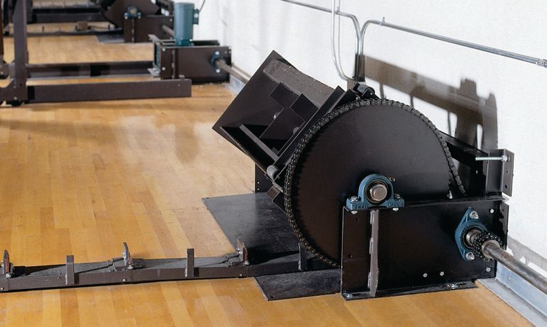 A side view of the non-friction powered option for the Interkal telescopic bleachers. 