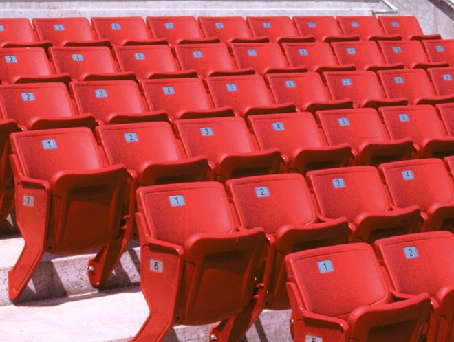 Blue and Red Interkal AURA Solid Stadium Chairs featured at Sec Taylor Stadium.