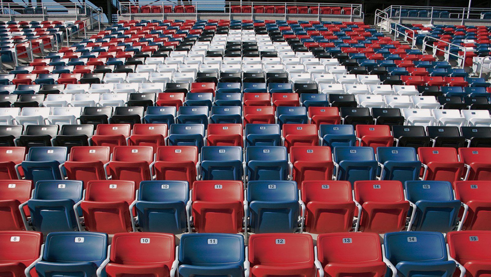 Interkal AURA Solid Stadium Chairs in red, white, blue and black at the iconic Talladega Superspeedway.