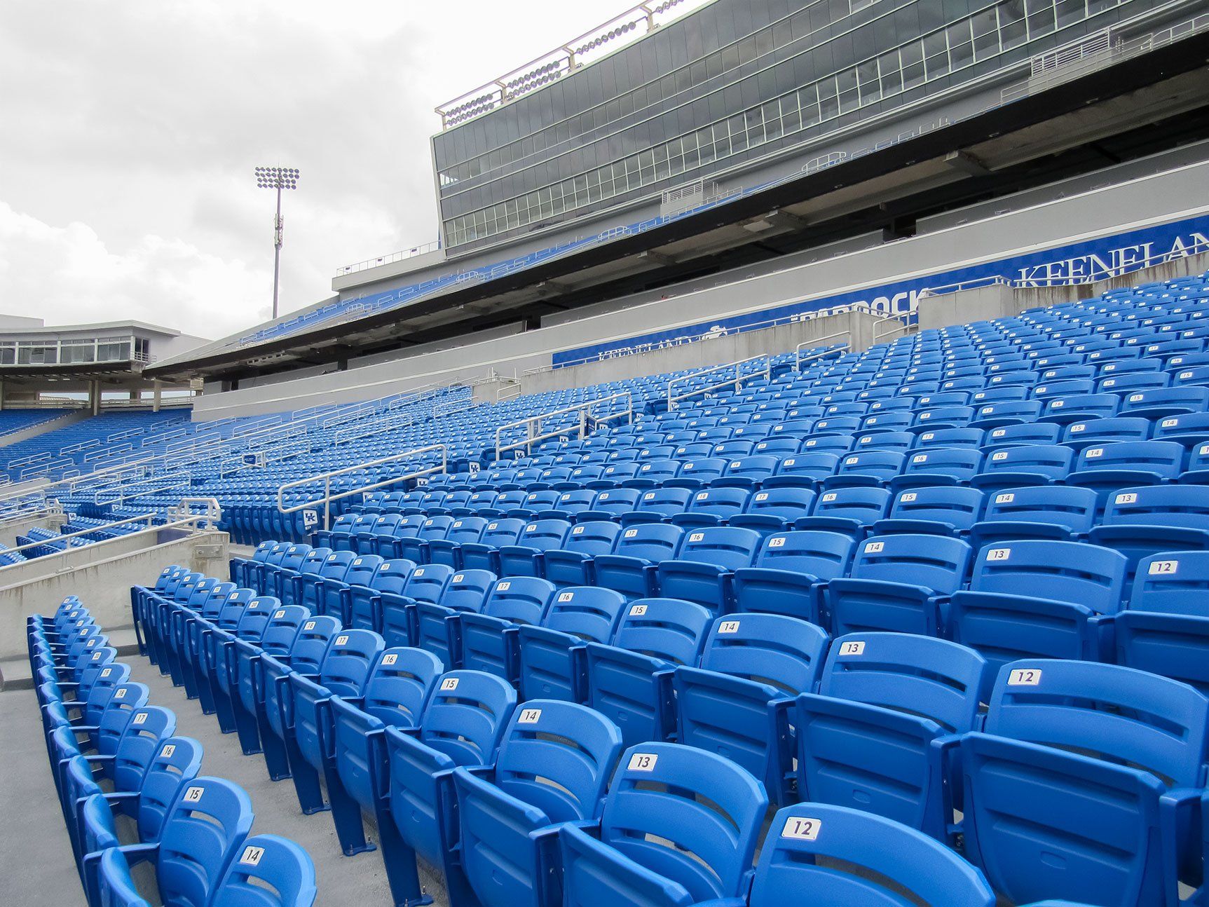 Blue Interkal AURA Slat Stadium Chairs at Kroger Field, on the University of Kentucky.