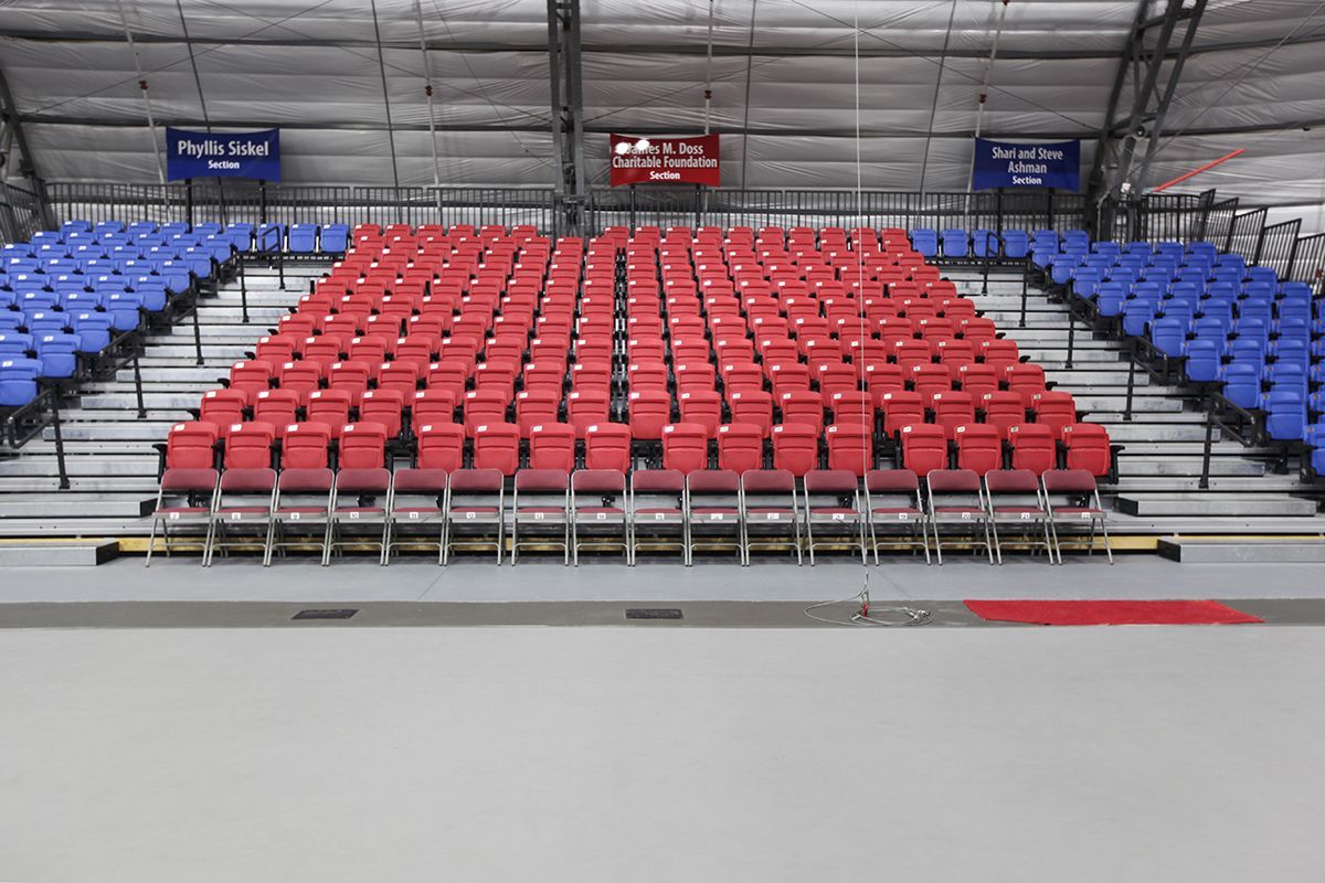 Red, Blue Interkal VISION Platform Chairs on a Wide Deck Premier Platform at the Circus Arts Conservatory in Florida.