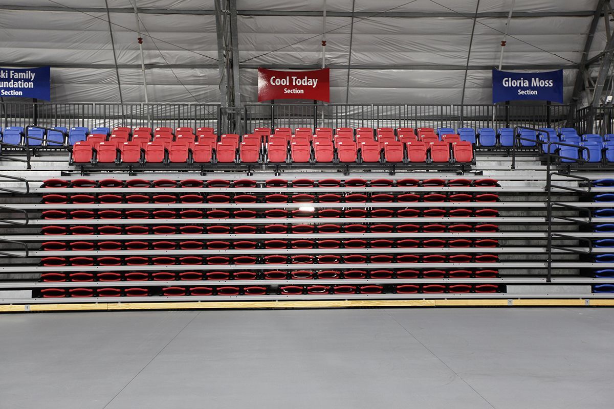 Red, Blue Interkal VISION Platform Chairs on a Wide Deck Premier Platform at the Circus Arts Conservatory in Florida.