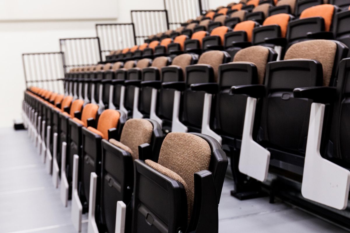 Interkal upholstered VISION Platform chairs with tablet arms on a Wide Deck Premier Platform at Cornell Secondary School.