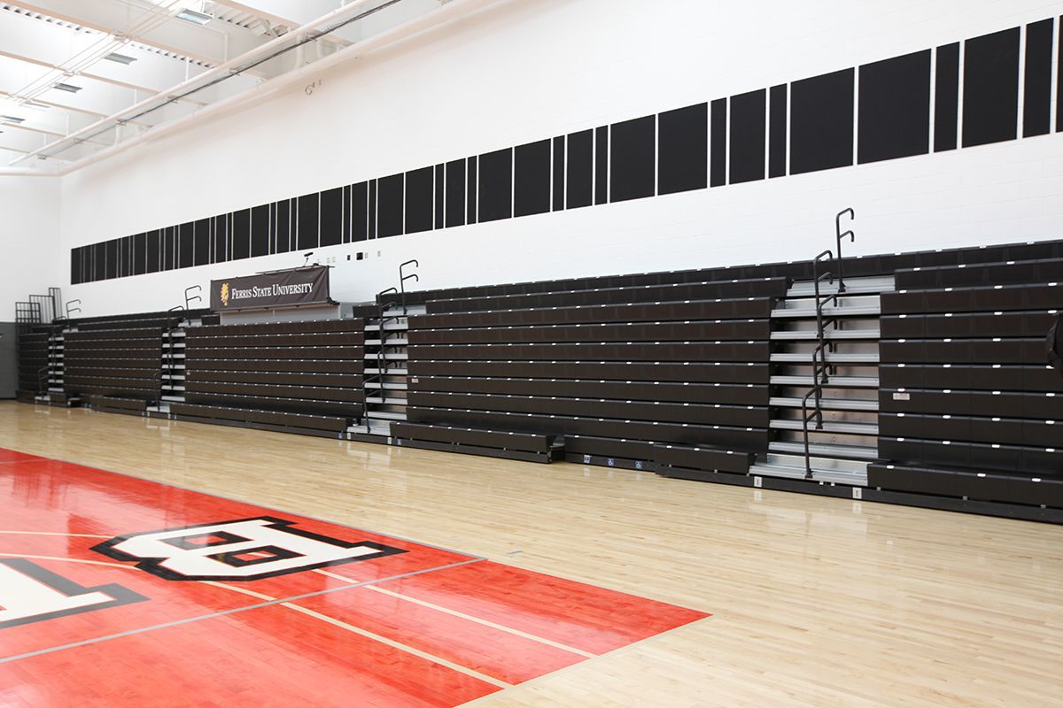 Interkal EXCEL Seat Modules with ComfoBack Backrests on a Wide Deck Premier Platform at the Ferris State University gym.