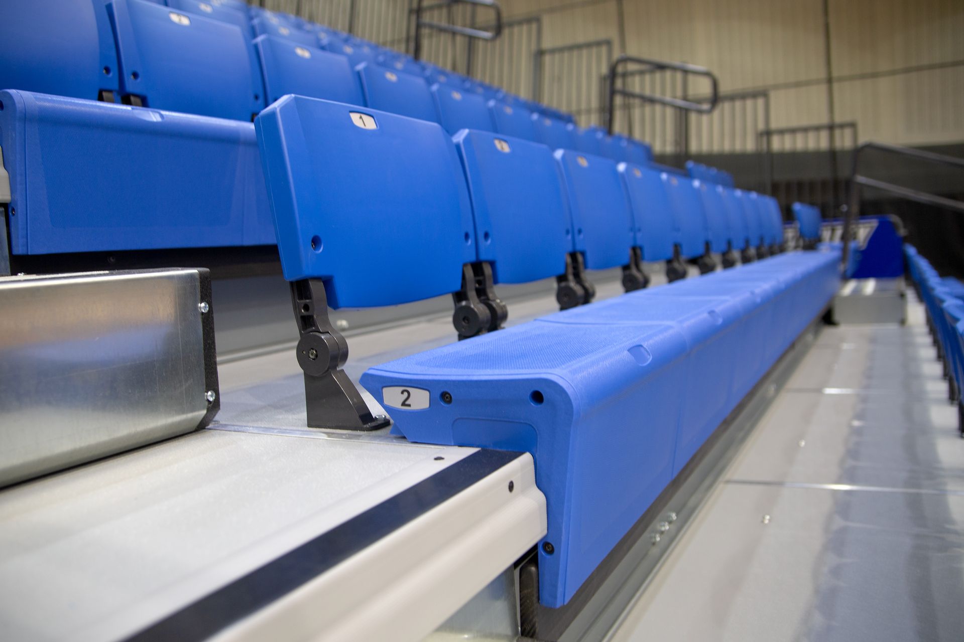Close up of Royal Blue ESM bleachers with ComfoBack Backrest at Grand Valley State University