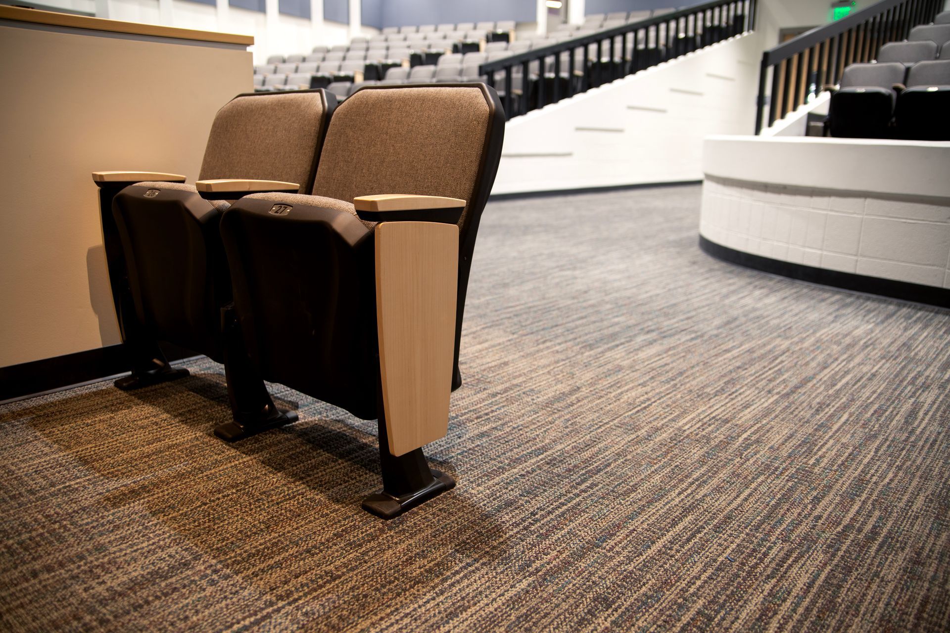 The auditorium at Montbello High School in Colorado, featuring ODYSSEY Auditorium Chairs with hardwood armrests, end panels.