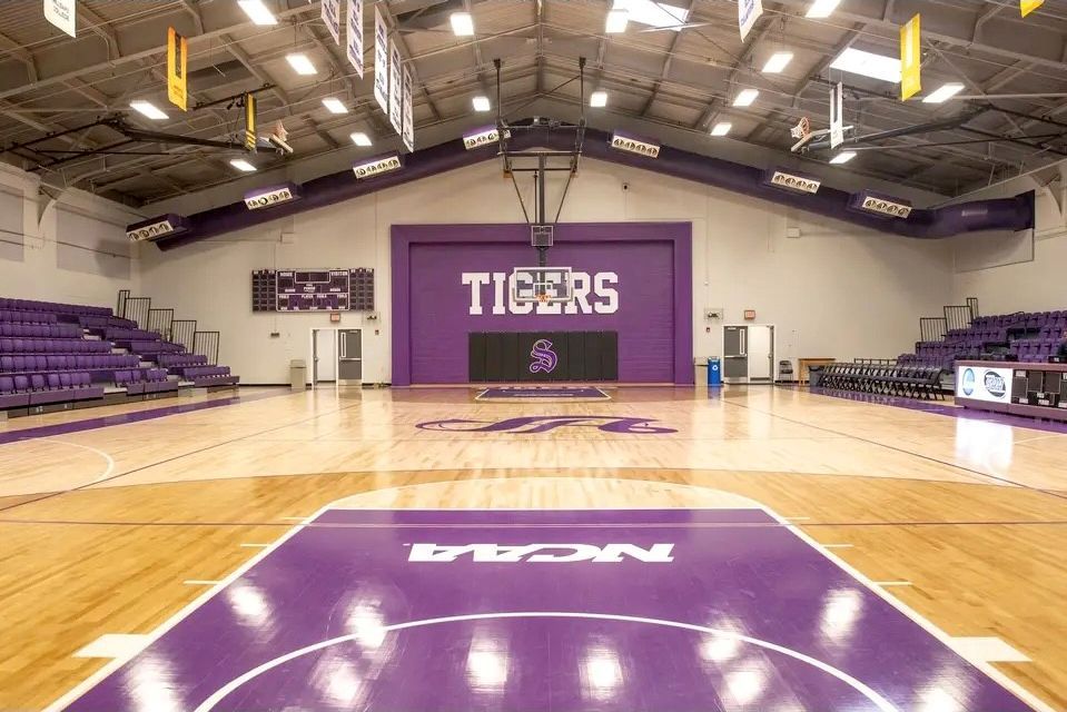 Purple Interkal VISION Platform Chairs on a wide deck premier platform in the gymnasium at Sewanee University.