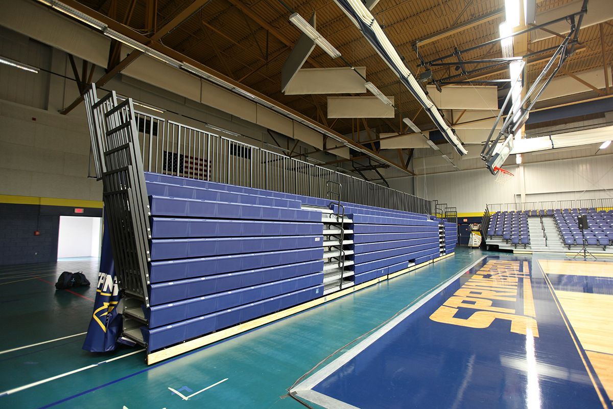 Free-standing bleachers with EXCEL Seat Modules and VISION Platform Chairs at the Spring Arbor University fieldhouse.