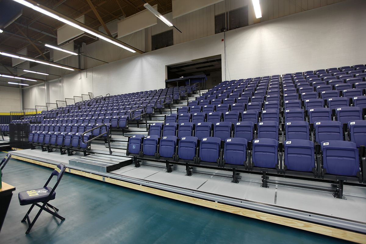 Free-standing bleachers with EXCEL Seat Modules and VISION Platform Chairs at the Spring Arbor University fieldhouse.