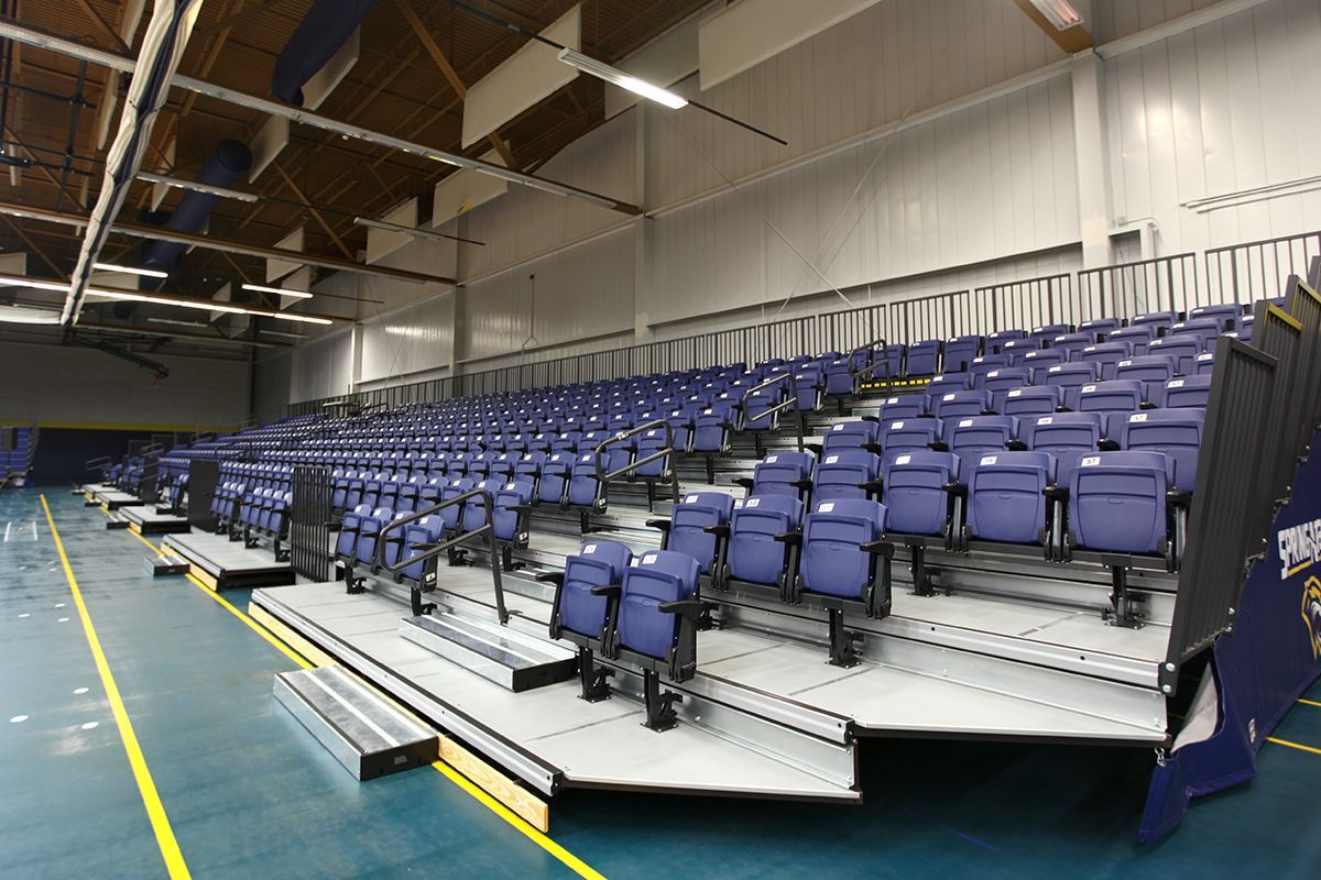 Free-standing bleachers with EXCEL Seat Modules and VISION Platform Chairs at the Spring Arbor University fieldhouse.